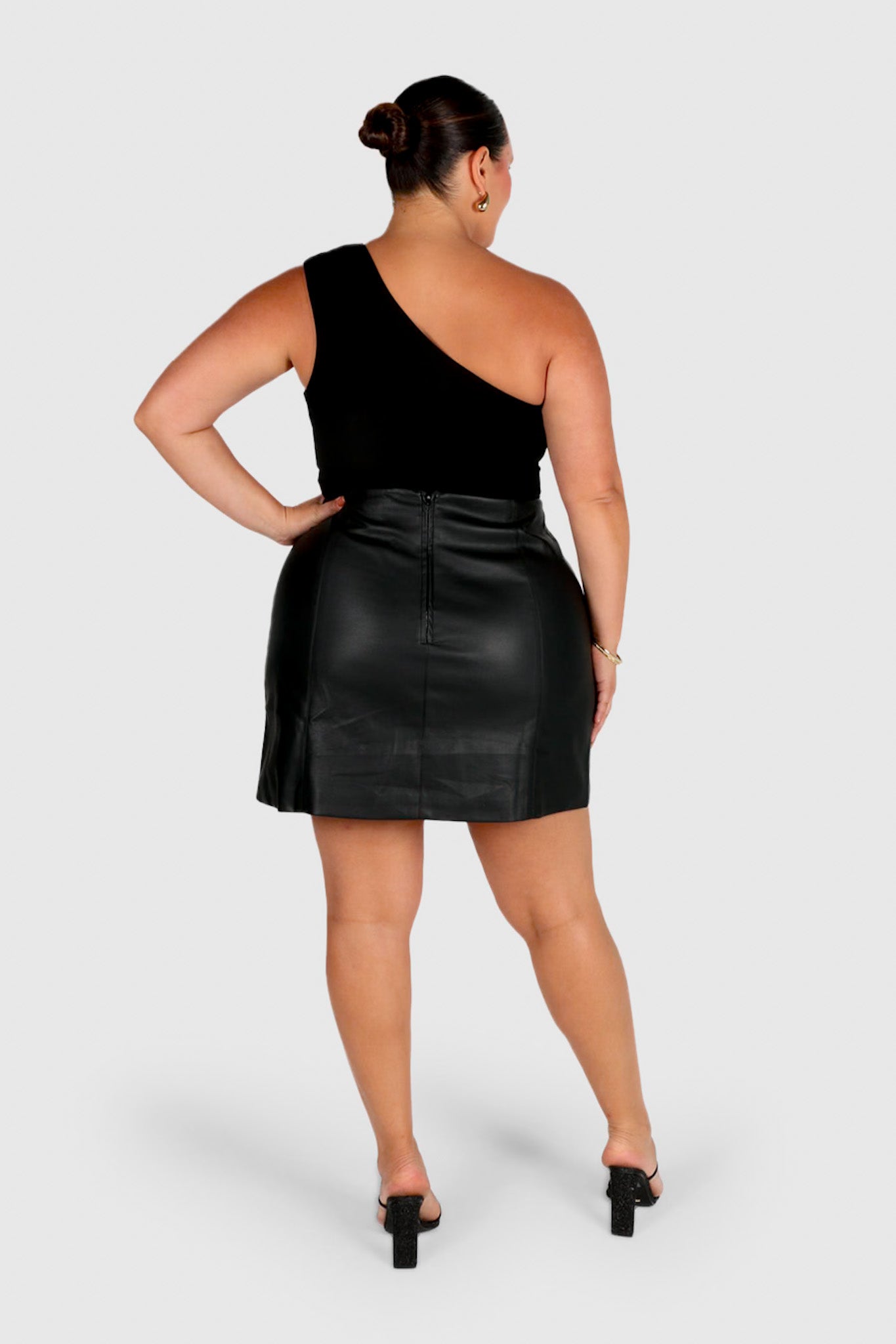 Office Outfit: Black Faux Leather Skirt And Chunky Sweater - The Beverly  Adams