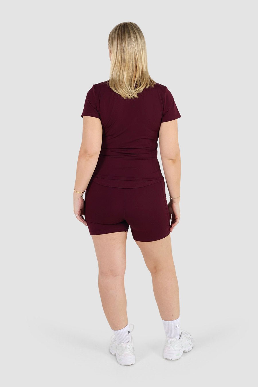 FORM FLOW POCKET SHORT PLUM - Fayt The Label